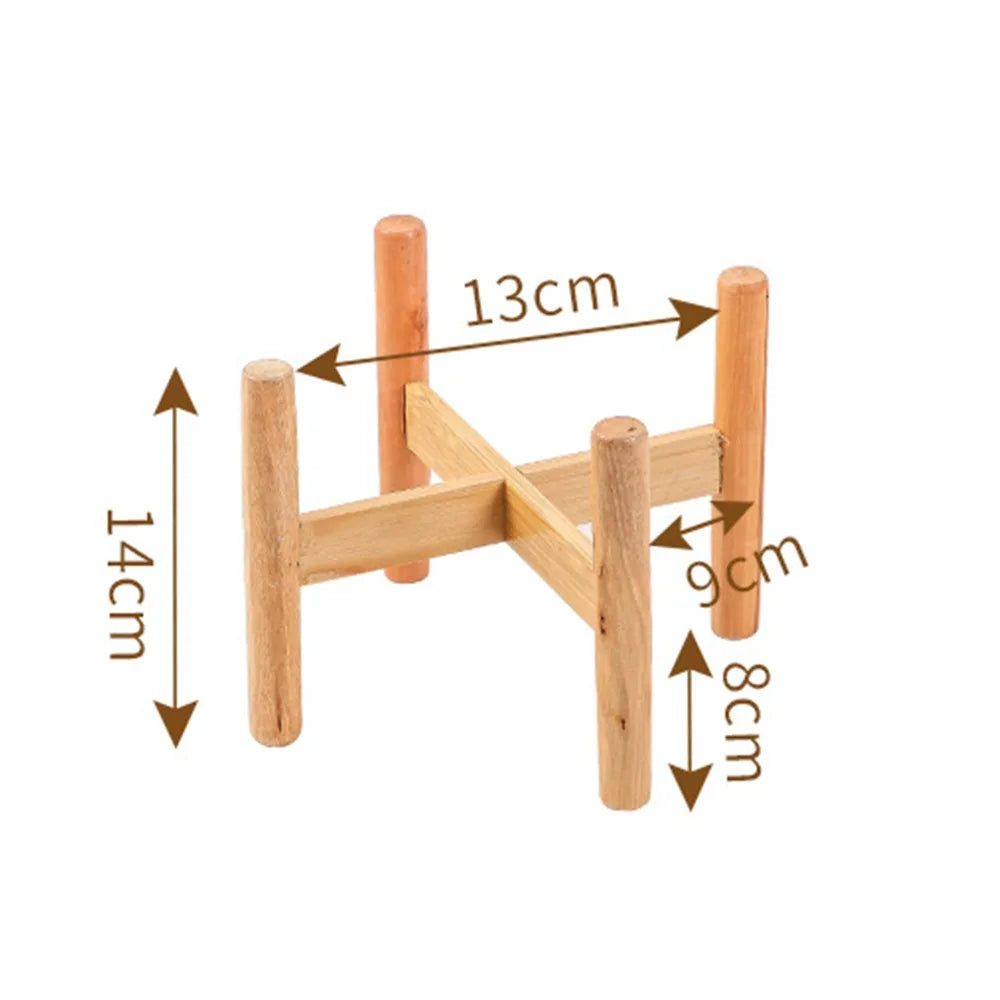 Wooden plant stand with four legs, measuring 13cm wide and 14cm tall for home decor.