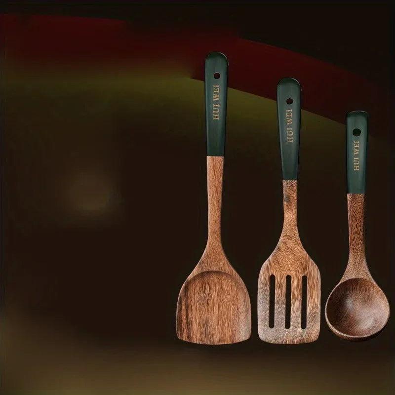 Set of three HomesshopUK wooden kitchen utensils with black handles: spatula, slotted turner, and spoon