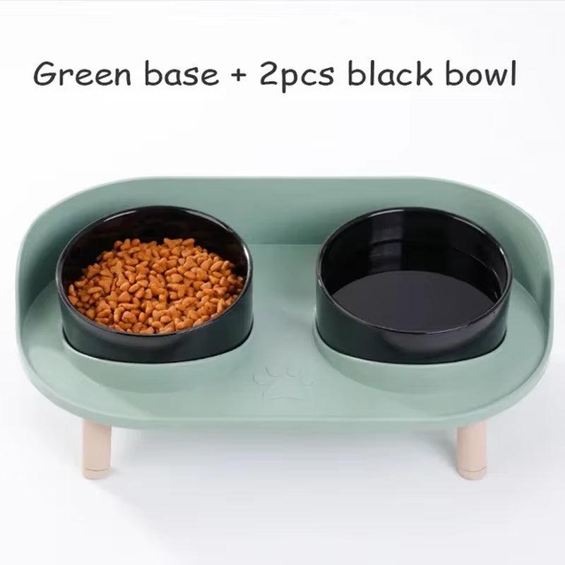 HomesshopUK elevated double bowl pet feeder with a green base and two black bowls